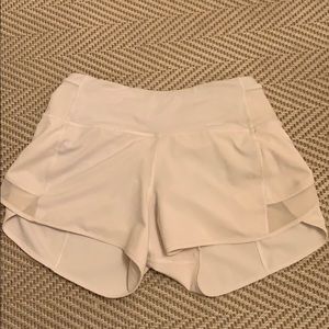 white lululemon shorts